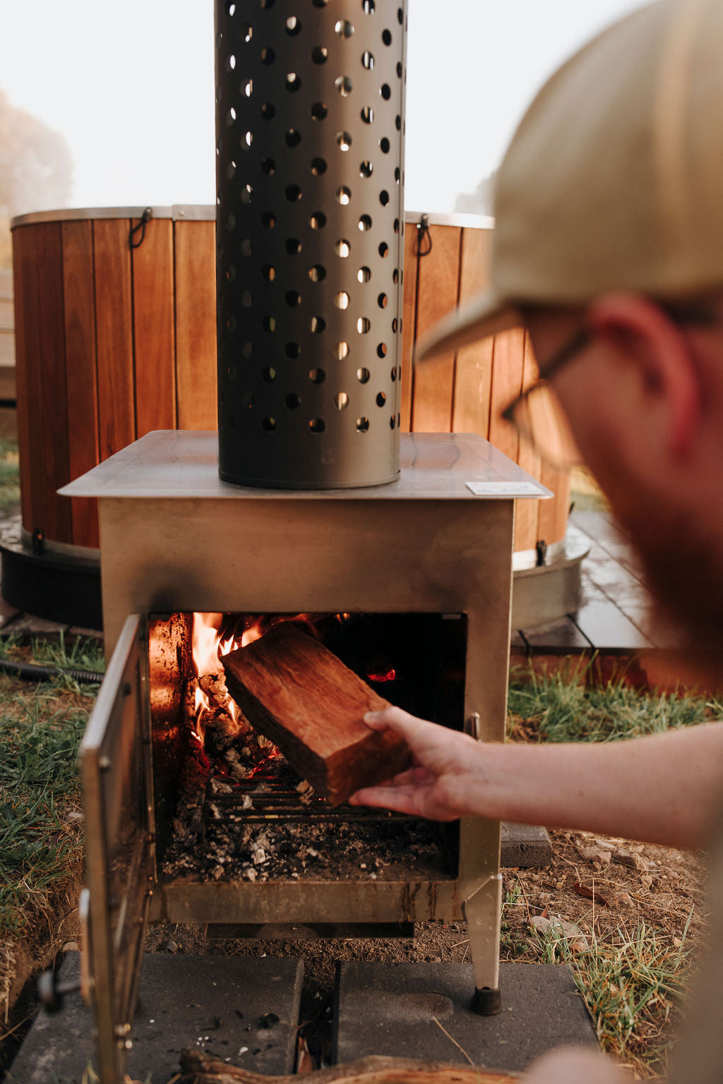 Ember wood-fired hot tub photographed in a bushland environment