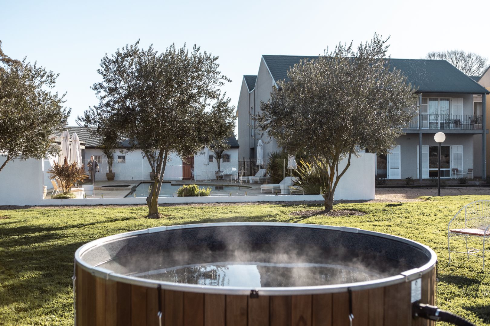 Ember wood-fired hot tub experience surrounded by bushland