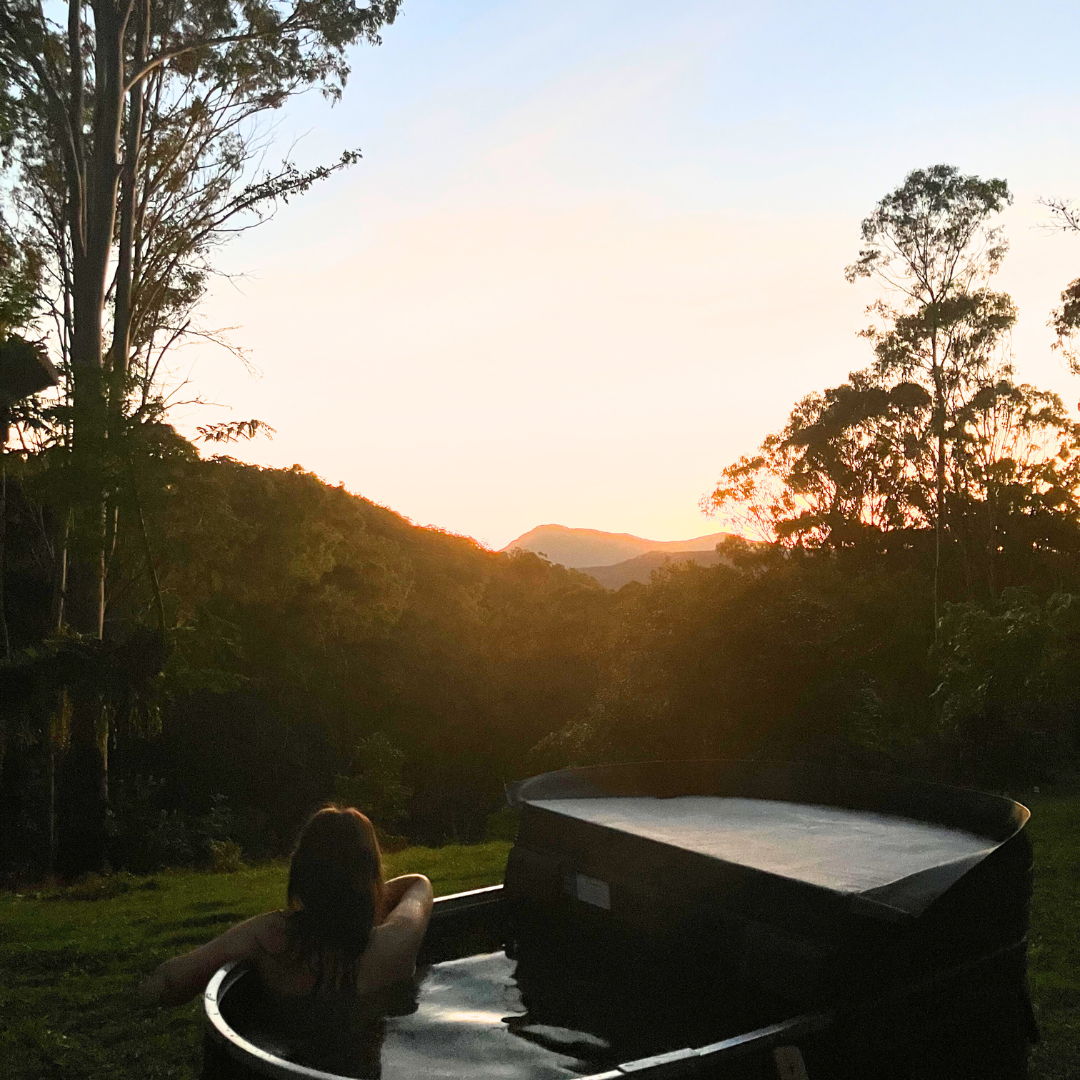 Ember Hot Tubs promotional graphic highlighting wood-fired hot tub lifestyle